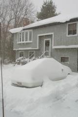 snow-covered car