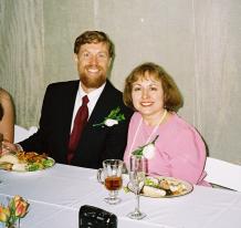 the parents of the bride at the head table about to enjoy their meals