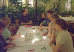 family members playing Sequence