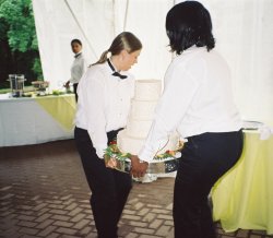 the cake being carried to the patio