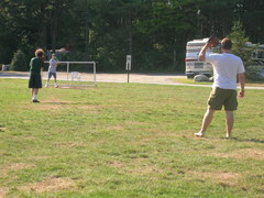 Kevin, Phil, and Steve play baseball.