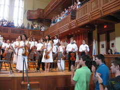 musicians standing on stage