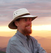 Scott enjoying sunset from Mt. Garfield